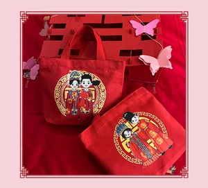 Detail of red wedding canvas tote bags with traditional Chinese motifs and sturdy handles