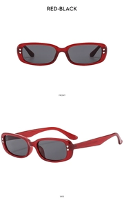 Detailed front and side views of red translucent square sunglasses with heart rivets