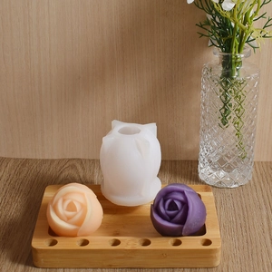 Macro view of flexible silicone rose mold with detailed petal textures for candle making