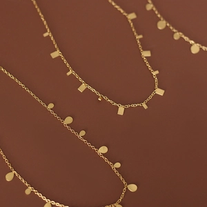 Titanium steel geometric pendant necklace with sparkling gold round square and drop charms