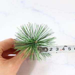 Artificial green pine needle garland for Christmas decor, measuring 4-5cm in diameter