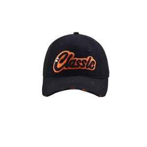 Detail of 3D Classic embroidery and distressed fabric on a black vintage baseball cap