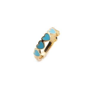 Macro detail of golden heart ring featuring vibrant cyan enamel inlay and polished finish