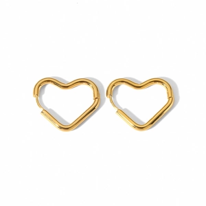 Macro detail of high-polish 18K gold stainless steel heart-shaped hoop earrings