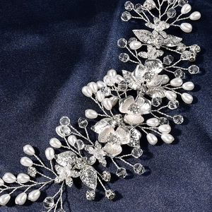 Elegant bridal hair vine with silver wire, white pearls, and crystals on blue silk