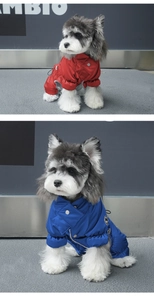 Close-up of windproof pet puffer jackets in red and blue with adjustable drawstring