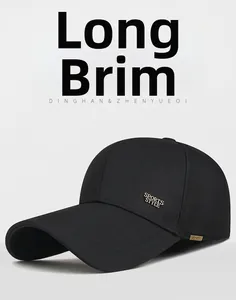 Detailed side view of black baseball cap featuring an extended visor and metal sports badge