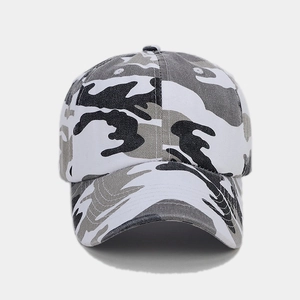 Detail of camouflage baseball cap with six-panel structure and curved brim design
