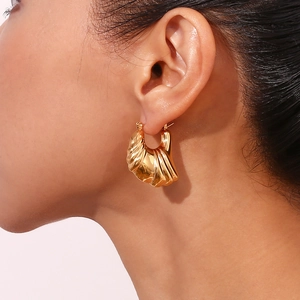 18K gold plated stainless steel hollow irregular wing earrings with stylish spiral texture