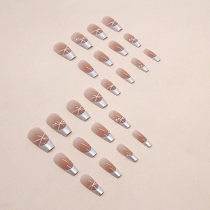 Long ballet press-on nails with nude blush base, silver French tips and pearl accents