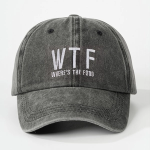 Close-up of high-quality white embroidery text on washed cotton baseball cap