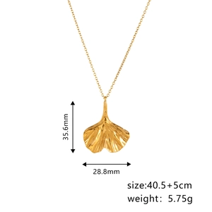 Detail view of gold ginkgo leaf pendant necklace with dimensions and weight specs