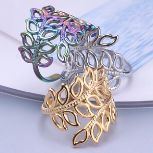 Three hollow leaf adjustable stainless steel rings in iridescent, silver, and gold finish