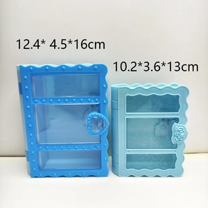Light blue book-shaped DIY jewelry storage box with wave edges and heart clasp details
