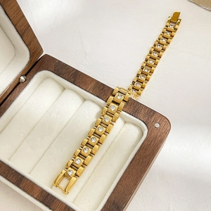 Luxurious 18K gold plated titanium steel watch-link bracelet with white crystal inlays