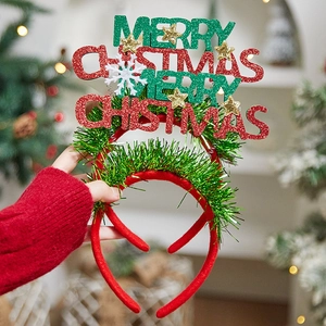 Festive Merry Christmas headband with glitter letters and green tinsel for holiday party
