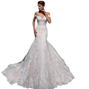 Elegant white lace mermaid wedding dress with off-shoulder neckline and a long luxury train