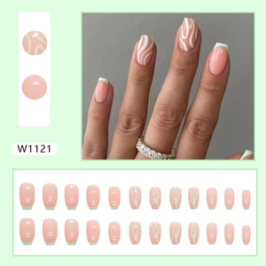 Short ballet press-on nails with pink base, green wave patterns and French tips design