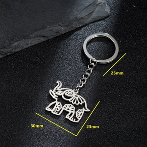Polished hollow elephant pendant keychain in stainless steel with dimension markings