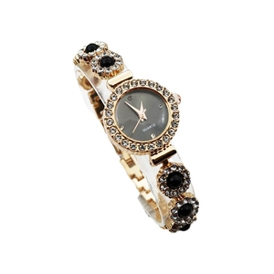 Elegant gold bracelet watch with black chalcedony and diamonds in floral metal design