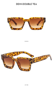 Detail view of retro square sunglasses featuring tortoiseshell frames and tea gradient lenses