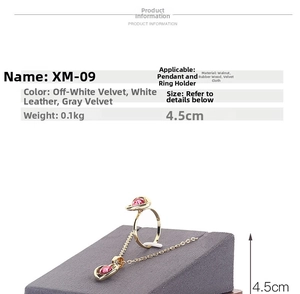 Detail view of wooden jewelry display stand with grey velvet surface and dimensions