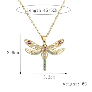 Detail showing colorful dragonfly pendant dimensions 3.3cm by 2.8cm on a gold chain