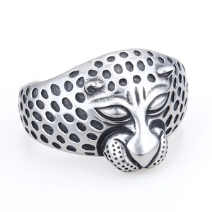 Men's heavy stainless steel open cuff bracelet with a detailed 3D leopard head design