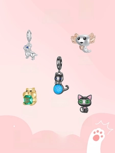 Detailed close-up of s925 silver hamster and opal animal charms for DIY bracelets