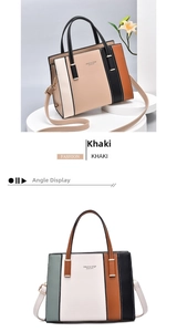 Detailed close-up of khaki color-block handbag showing dual handles and sleek metal buckle