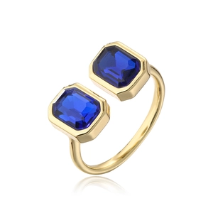 Detail view of 18K gold plated ring featuring two rectangular blue zircon stones