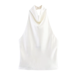 Detail shot of white satin halter top featuring silky fabric texture and draped neckline