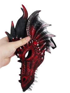 Close-up of a dragon mask with realistic red scale textures and black horns