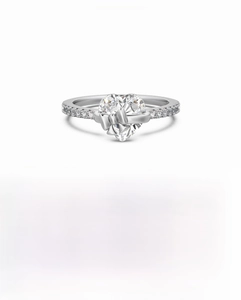 Detailed macro view of S925 silver heart ring with 8mm zircon and bow decoration