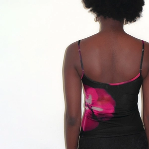 Detail of adjustable straps and back view of floral printed slim crop top for women