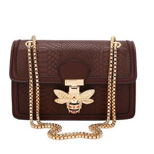 Retro dark brown snake pattern crossbody bag with a large golden bee pearl buckle and chain