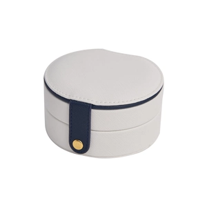 Portable round jewelry travel case in white textured finish with blue button strap