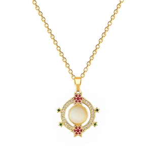 Golden necklace with cat-eye stone, sparkling zircons, and colorful gemstone accents