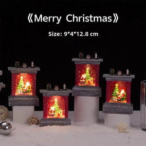 Lighted Christmas fireplace scene with Santa and tree, measuring 9x4x12.8cm