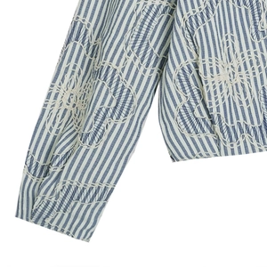 Blue and white striped long sleeve jacket featuring detailed white floral embroidery