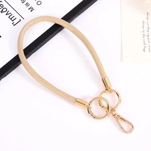 Beige PU leather wristlet strap with gold keychain clasp for bags and keys accessories