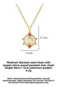 Detailed size view of a gold titanium necklace with a crystal cat-eye pendant