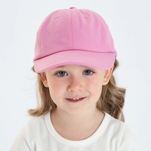 Detailed close-up of a pink cotton baseball cap for kids with breathable eyelets