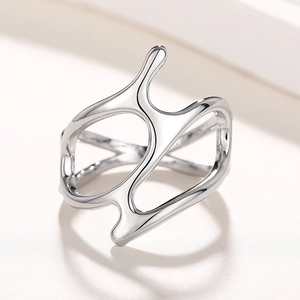 Minimalist liquid metal ring with organic silver fluid design for trendy aesthetic