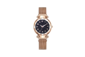 Detail of rose gold mesh band and starry sky dial on a lady's quartz watch