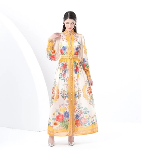 Detail of vintage floral maxi dress with stand collar, lantern sleeves and waist belt