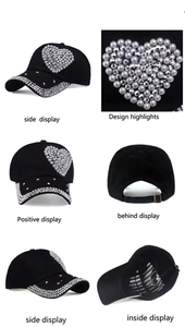 Detail view of black baseball cap with heart pattern made of pearls and rhinestones