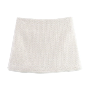 Detailed flat lay of white tweed A-line skirt featuring clear woven fabric texture