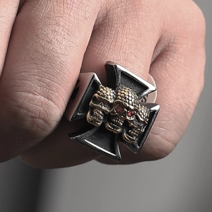 Men's gothic stainless steel ring with bronze skulls and red gemstone eyes