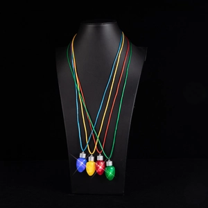Set of four glowing LED bulb necklaces in blue yellow red and green on a black bust